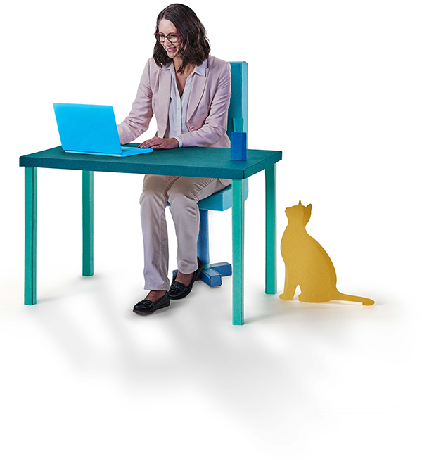lady at desk with laptop and cat