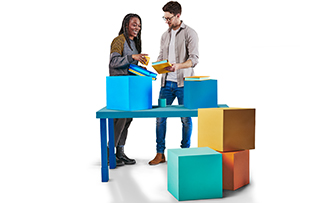 Couple in front of coloured blocks